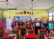 Polres Minsel Bagikan Ratusan Paket Makanan Bergizi Gratis di Tiga Sekolah